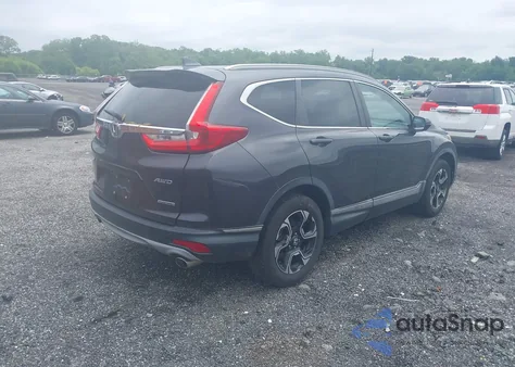 2017 Honda Cr-V Touring z USA, uszkodzony, nr VIN 2HKRW2H99HH615018